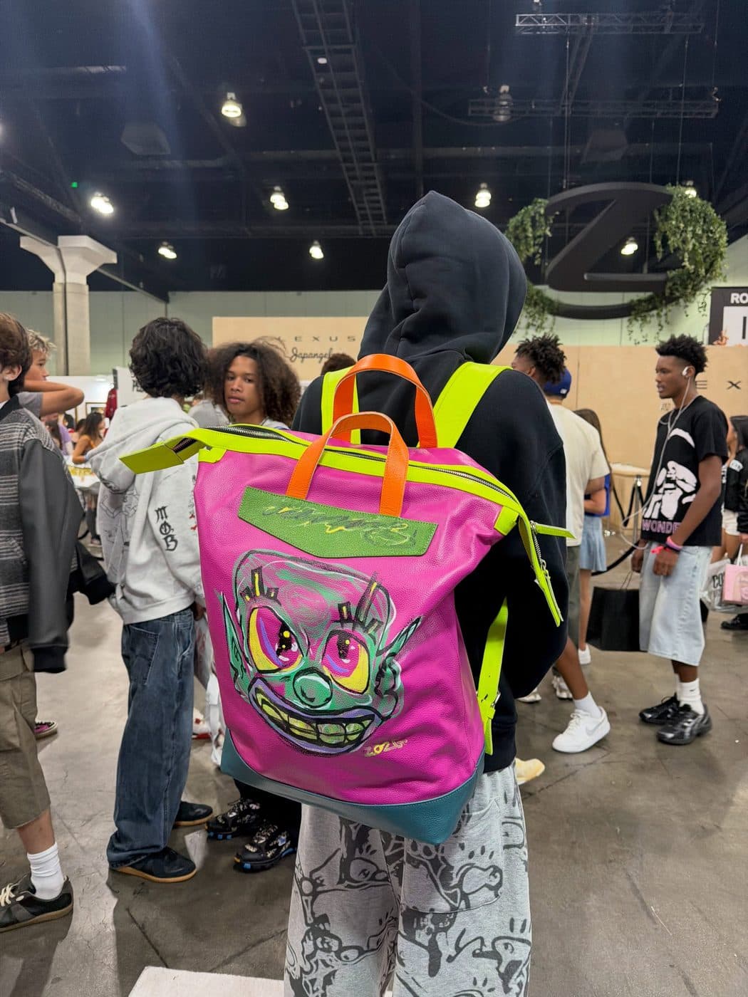 A hand-painted backpack on the show floor