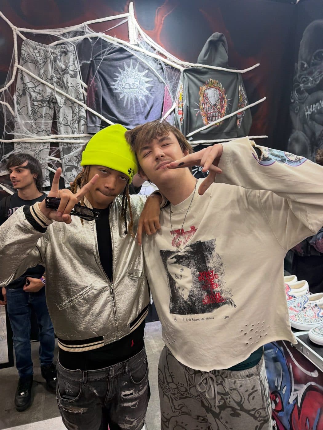 Hemsley with a visitor at the booth